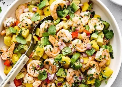 Delicious mango avocado shrimp salad served in a bowl.