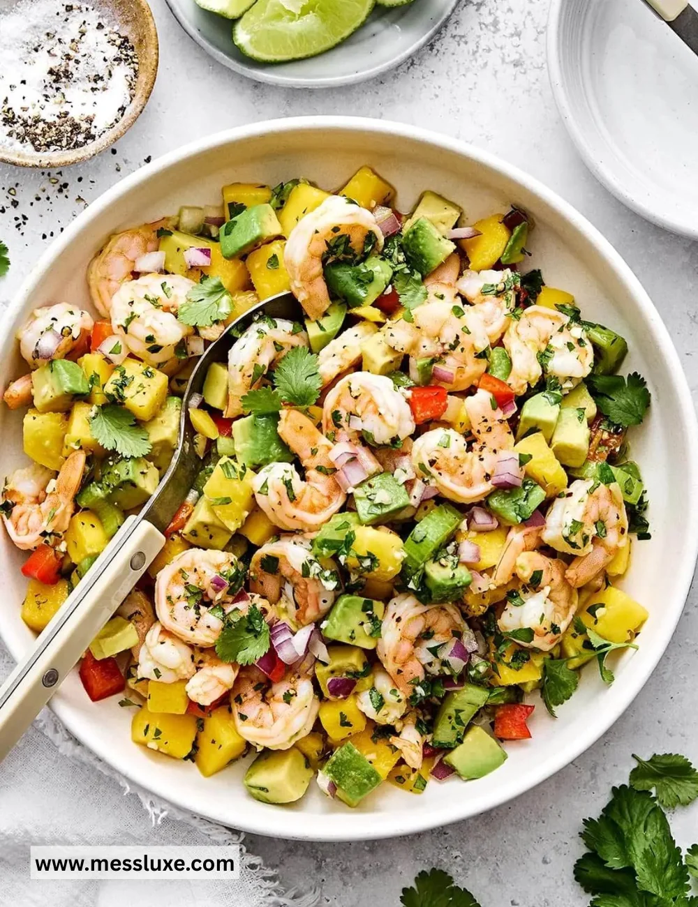 Delicious mango avocado shrimp salad served in a bowl.